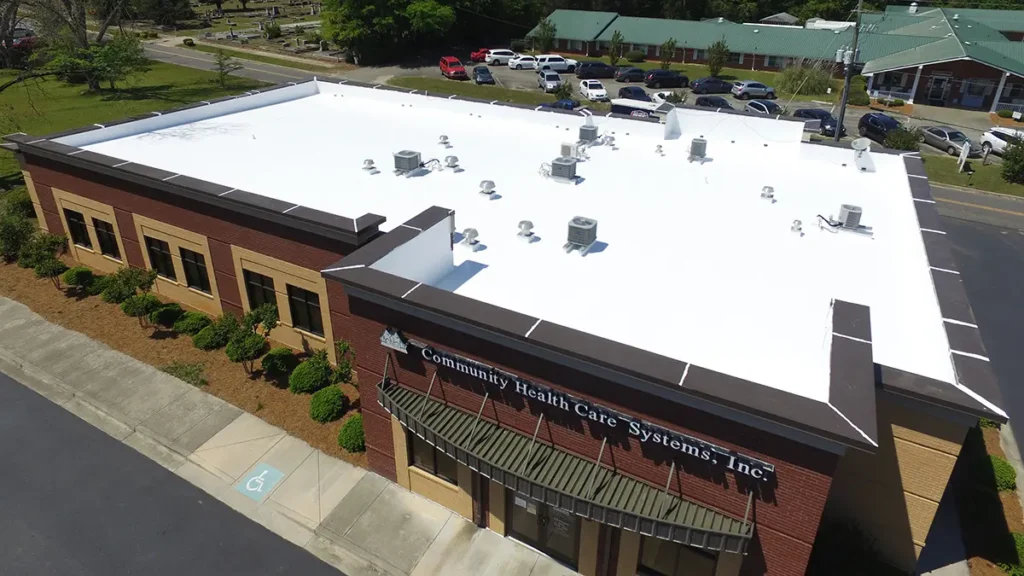 Aerial view of office building roof with Silicone top coat of Ure-A-Sil system