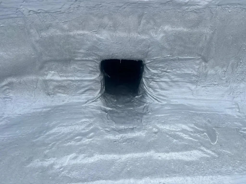 Close up image of scupper treated with aromatic urethane coating.