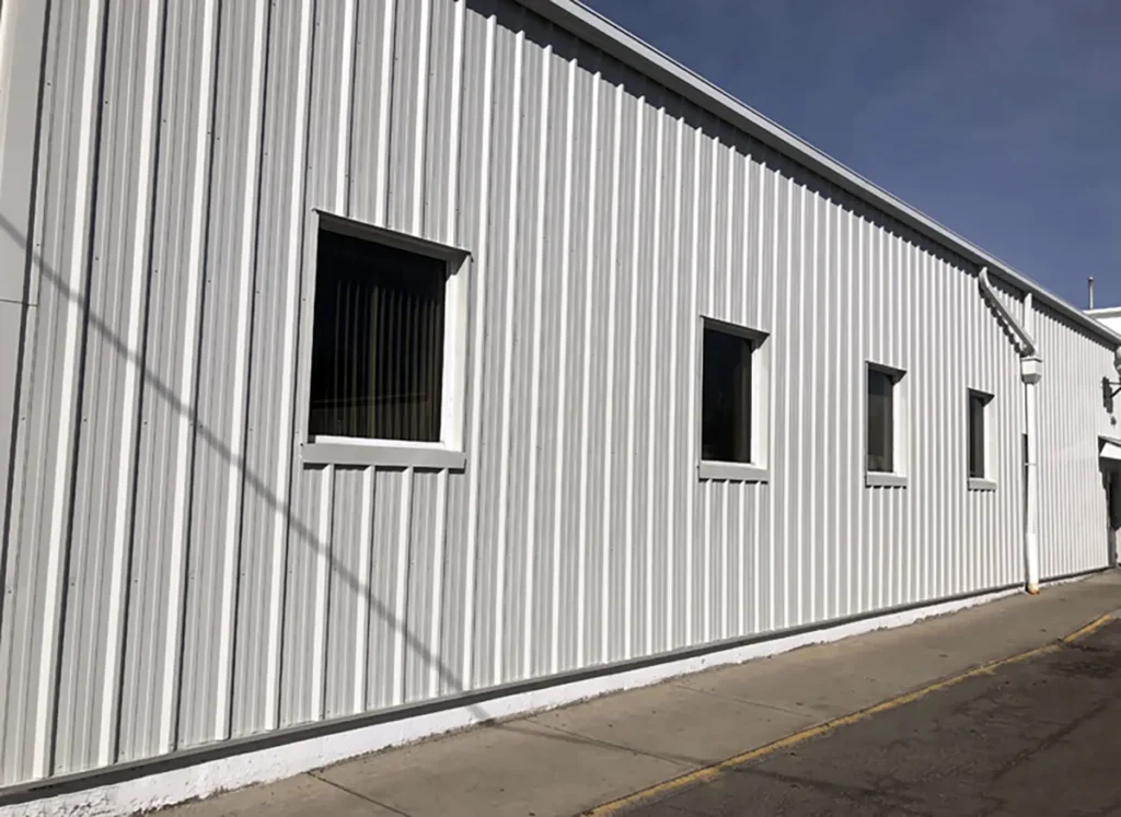 Recently finished direct-to-metal coating application on commercial metal building