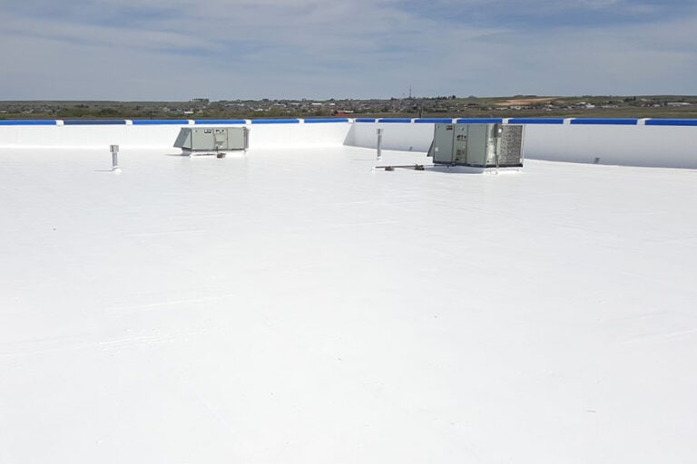 Finished elastomeric silicone roof, showcasing its high-performance, flexible coating that adapts to roof movement while maintaining excellent protection and extending roof lifespan.