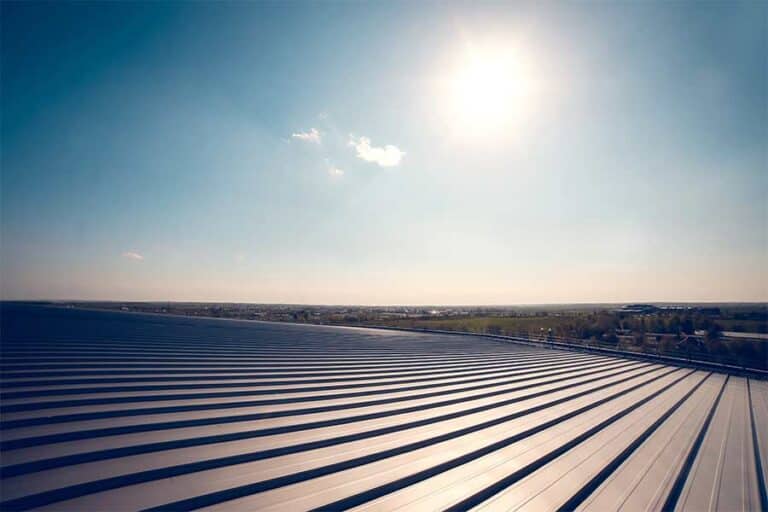 Wide view of a commercial metal roof, showcasing its durable construction and weather-resistant features.