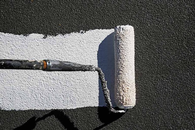 Close-up of a roller applying liquid roofing to a roof, ensuring an even, seamless layer for enhanced waterproofing and long-term protection.