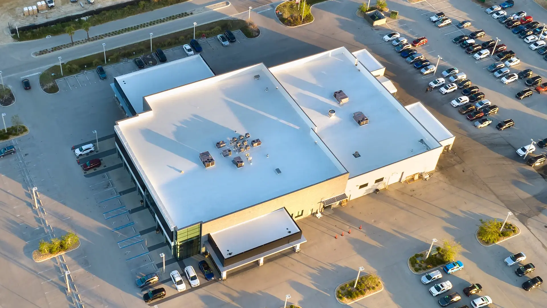 Aerial view of commercial building with roof coating system