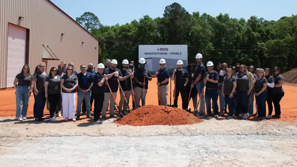 Group of American WeatherStar employees at groundbreaking ceremony