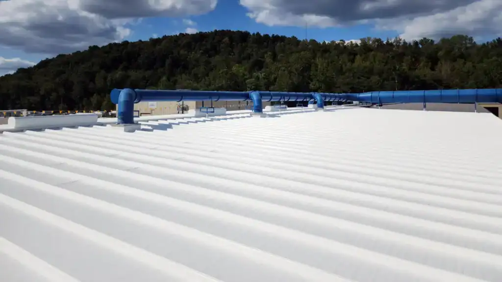 Acrylic roof coating on commercial metal roof