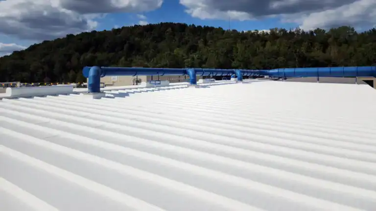 Acrylic roof coating on commercial metal roof