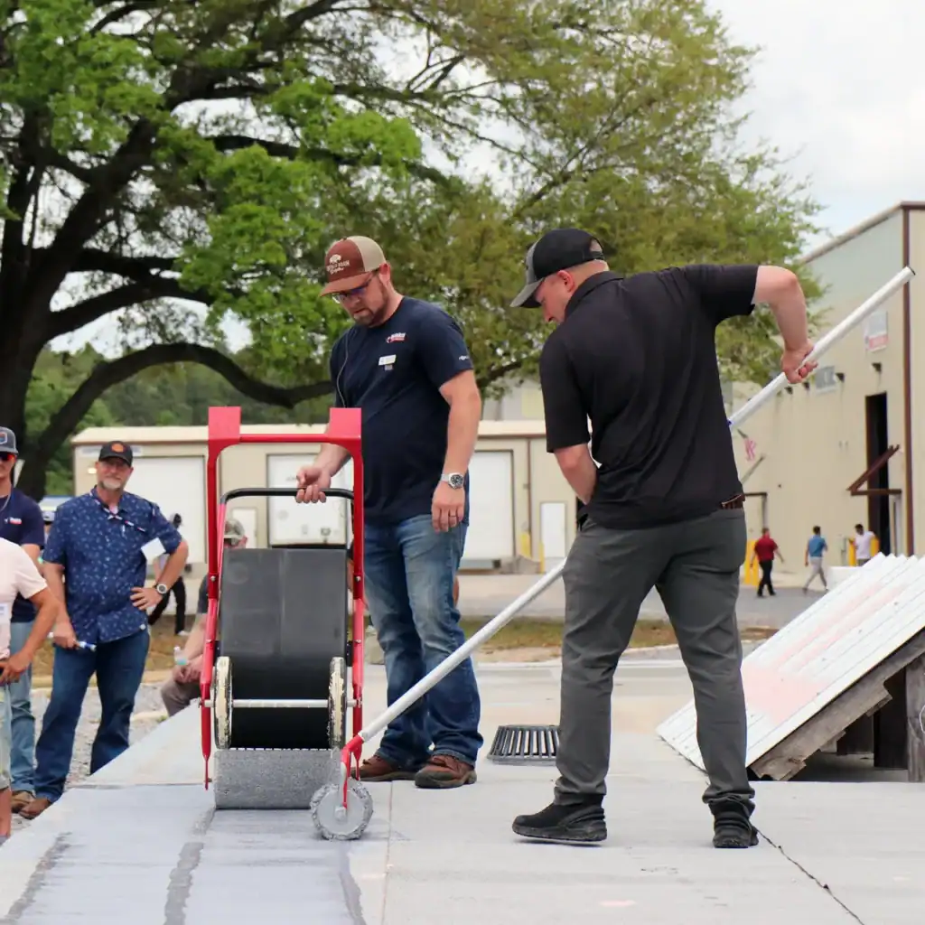 Contractors participating in roof coatings training course