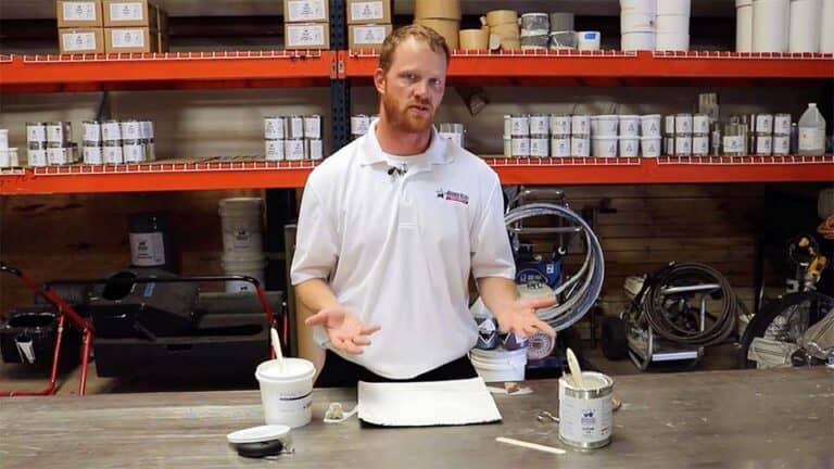 Eric Long demonstrating adhesion properties of different roof coatings
