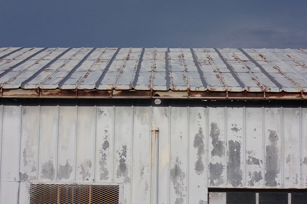 Entire industrial roof with rust and corrosion due to old age. 